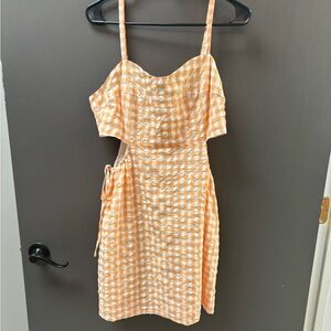 Sweet orange dress with side details